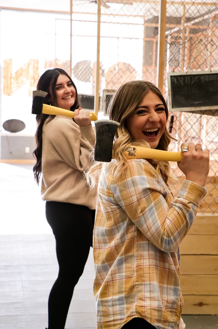2 girls with axes